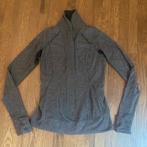 Gray/black long sleeve Lulu 1/4 zip pullover sweater.